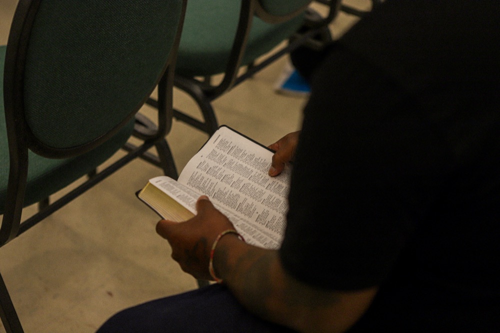An open Bible during a Church of the Apostles gathering
